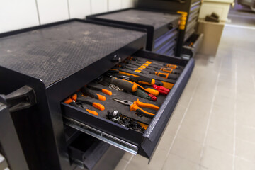 Repair shop, tool kit console desk and tools detail

