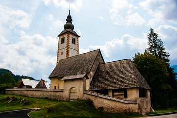 Fototapeta na wymiar Scenic Church at Lake Bohinj in Slovenia