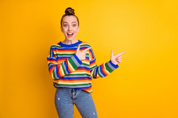Photo of surprised girl promoter point index finger copyspace impressed advertisement promotion...
