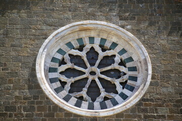 Detail of the facade of the church of Sant'Agostino in Montalcino in Tuscany, Italy