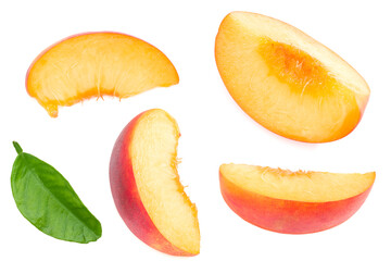 peach fruit with green leaf and slices isolated on white background. top view