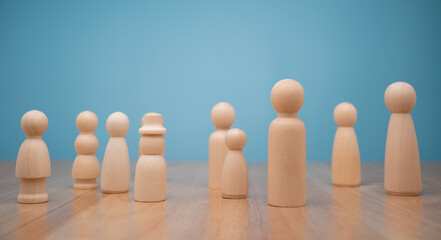 Many wooden human figures, Man and woman standing. Concept of Human resource, Talent management, Recruitment employee