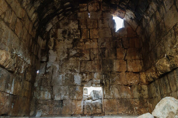 Fototapeta na wymiar Interior of mausoleum of Queen Aba in ancient city Kanli Divane or Canytelis, Ayaş, Turkey. It was built as crypt for her family in 2 century AD. Now crypt is absolutely empty