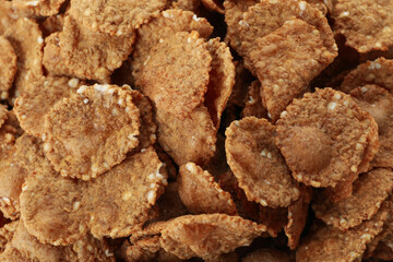 Tasty chocolate muesli on whole background, close up