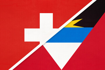 Obraz premium Switzerland and Antigua and Barbuda, symbol of national flags from textile. Championship between two countries.