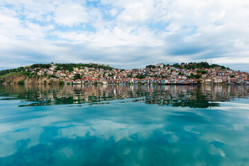 Fototapeta na wymiar Ohrid old city reflecting in Lake Ohrid, Macedonia