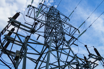 Bottom view onto high voltage transmission line pole