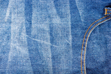 clothing items blue stonewashed faded jeans cotton fabric texture with seams, clasps, buttons and...