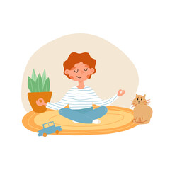 Cute red head kid in striped vest and jeans put down a toy and meditates in lotus pose, cat sits nearby and looks.