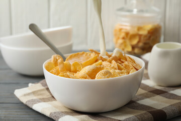 Concept of breakfast with muesli on wooden table