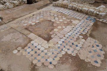 Remains of medieval floor mosaics in castle Kizkalesi. There are hexagonal & quadrangular forms of...