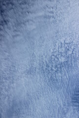 Unusual clouds high in the sky. Russia.