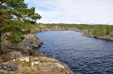 Ladoga lake bay Skerry in Russian Karelia. stone Islands with pine trees Summer