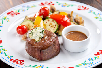 steak with grilled vegetables closeup