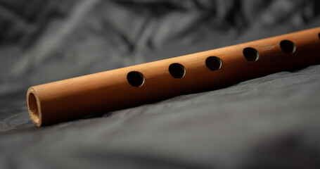 Bamboo flute on black background