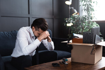Young man getting fired from his job