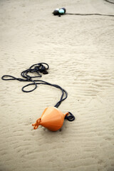 Buoy on beach sand