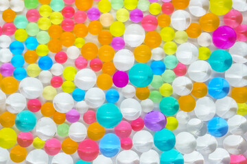View from above onto small multi-colored balls