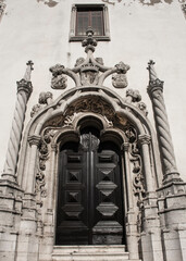 Ornate Wooden Door With Arch And Sculpted Stone Border, Lisbon, Portugal  