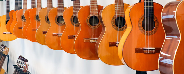 Room for a music lover. Lots of guitars hanging on the wall.