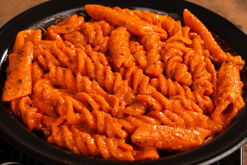 Italian Style Cuisine Fresh Red Sauce Pasta on Vintage Background