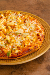 Indian Style of Italian Dish Paneer Pizza Topped with Cottage Cheese