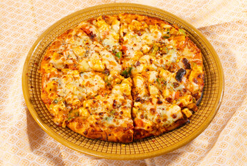 Indian Style of Italian Dish Paneer Pizza Topped with Cottage Cheese