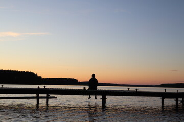 Naklejka na ściany i meble Beautiful sunset on the lake in Poland.