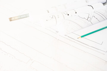 Paper architectural drawings and blueprint, interior design plans and projects