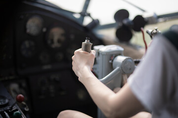female pilot flying a plane © Наталья Бирюкова