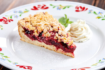cake with berries and whipped cream