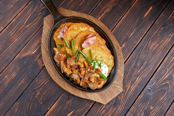 potato pancakes with mushrooms and bacon