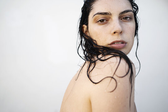 Portrait of a beautiful Young woman with wet hair