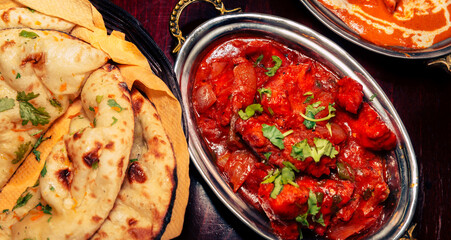 assorted indian curry and rice dishes