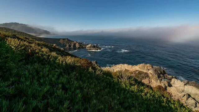  Timelapse tracking shot of fog bow at rugged coastline in Big Sur in Central California