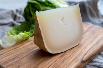 Cheese collection, French sheep cheese ossau iraty from Pyrenees mountains.