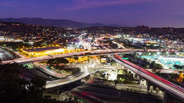  Timelapse long exposure of traffic at major interchange of interstate 5 and 110 freeway in Los Angeles, California