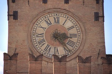 Antique clock of the Palazzo d'Accursio in Bologna, Italy
