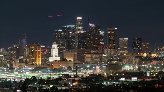  Time lapse telephoto shot of downtown Los Angeles skyline at night