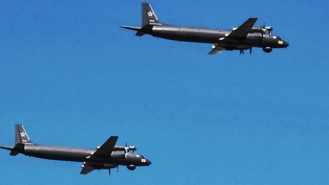 military aircraft bomber flying in the blue sky at an air show