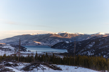 View of a valley on a sunrise in the mountains in winter