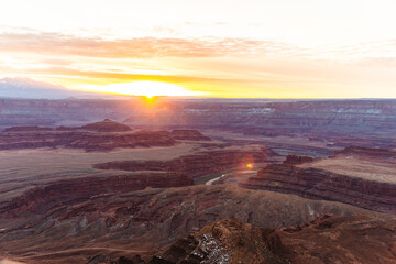 Fototapeta na wymiar bright sunrise in the american red canyons in summer with a view down