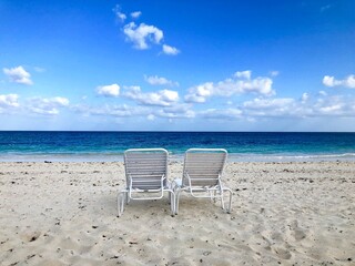 chairs on the beach, love on the beach