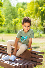 Portrait of little boy in autumn park