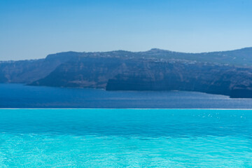 Fototapeta premium Swimming pool over Santorini caldera. Akrotiri, Santorini island, Cyclades, Greece, Europe