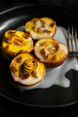 Baked apricots with coconut milk and nuts 