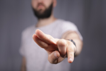 young man finger pointing touch modern