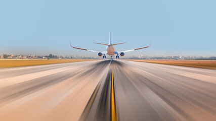 Passenger airplane landing to airport with motion blur - Airplane in motion