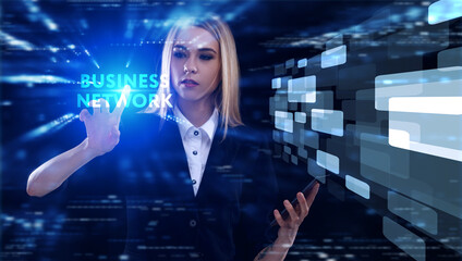 Business, Technology, Internet and network concept. Young businessman working on a virtual screen of the future and sees the inscription: Business network
