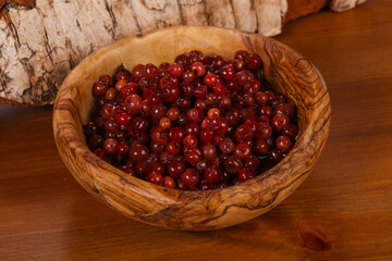 Traditional soaked cowberry in the bowl